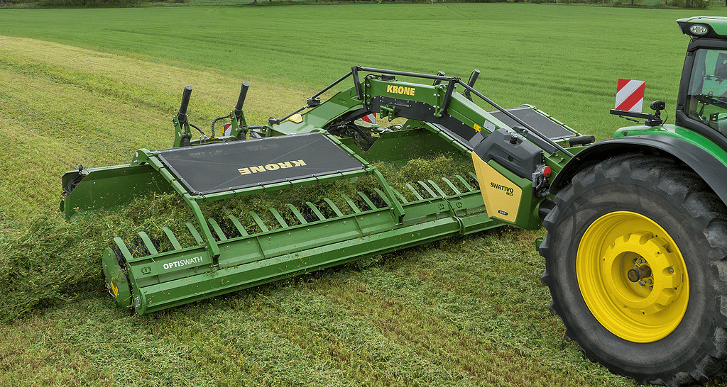With The Swativo T 1040 Pro, Krone Is Launching Its First-Ever Pickup Rake. Thanks To Its Flexible And Extremely Gentle Operation, This Swathing System Is Particularly Suitable For Leafy Forage Such As Lucerne. Spelle, May 2026: With The New Swativo T 1040 Pro, Krone Is Now Entering The World Of Pickup Rake Technology And Specifically Expanding Its Product Range To Include A Further Swathing System. While Rotary Rakes Are Particularly Effective For Grass And Straw From Stemmed Crops Such As Cereals, Pickup Rakes Offer Clear Advantages For Leafy And Herbaceous Crops Such As Lucerne Or Clover. Thanks To The Swativo T 1040 Pro’s Particularly Gentle Collection And Conveyance Of The Crops, Leaf Loss Is Minimised And Forage Quality Is Further Improved. This Means That, In Future, Krone Will Offer The Right Swathing Technology For Virtually Every Forage Plant And Every Application. “When Developing The Swativo T 1040 Pro, The Focus Was Not Only On Top-Quality Forage But Also On Consistent Swath Formation And Intuitive Ease Of Use – And That Is Exactly What We Have Achieved With This Machine,” Emphasises Tobias Reher, The Product Manager Responsible. The Pickup Rake Combines Tried-And-Tested Krone Technologies With Well-Thought-Out Design Features To Ensure Even Swathing, And, With A Maximum Working Width Of Up To 10.40 M, Proves To Be A Highly Efficient Link In The Harvesting Chain. Optiswath – Perfect Swathing With No Leaf Loss At The Heart Of The Swativo T 1040 Pro Lies The Optiswath Concept – Optiswath Combines Perfectly Coordinated Components Of The Swathing Units To Ensure A Constant Crop Flow And Even Swaths. The Easyflow Pick-Up, With Its Five Rows Of Tines, Ensures That The Crop Is Picked Up With Minimal Loss And Is Also Very Low-Maintenance. A Two-Part Design Ensures Optimal Ground Adaptation – Even In Difficult Conditions. Rubber-Coated Guide Rolls Guide The Pick-Up Safely Over Every Contour Of The Ground At The Set Working Height, Thereby Further Helping To Protect The Soil And Ensure Clean Forage Intake. In Combination With The Innovative Flexflow Feed Rotor, Krone Employs A Twin-Rotor System. As The Speed Of The Feed Rotor Can Be Flexibly Adjusted In Relation To The Pick-Up Speed, The Crop Flow Can Be Optimally Adapted To Different Harvesting Conditions. The Crop Is Therefore Thrown Onto The Conveyor Belt In A Controlled And Loose Manner; With A Width Of 1.20 M, This Belt Is Unique And Can Therefore Reliably Handle Even Large Volumes Of Crops. In Addition, The Conveyor Belt Is Mounted At A Steep Angle On The Machine So That It Feeds The Crops Directly Towards The Swath. The Belt Speed Can Be Adjusted As Required And Can Therefore Be Optimally Adapted To The Driving Speed Of The Tractor. In This Way, The Swativo T 1040 Pro’s Special Swathing Technology Prevents The Crops From Becoming Blocked And Therefore Ensures A Consistently Even Crop Flow. All Units Involved In The Crop Flow Control System Are Hydraulically Driven. To Ensure A Reliable Oil Supply, The Machine Features Its Own On-Board Hydraulic System Whose Pump Units Are Operated By The Tractor’s Pto Shaft. Confident Even In The Most Challenging Conditions The Driver Can Easily Adjust The Bearing Pressure Of The Pick-Up Units Hydraulically From The Tractor Cabin To Suit The Prevailing Ground Conditions. For Example, On Damp Ground, Reducing The Ground Pressure Helps To Ensure That The Delicate Sward Is Not Damaged. In Addition To The Hydraulic Pressure Relief On The Swathing Units, The Pick-Up Is Also Mechanically Relieved, Enabling It To React Extremely Quickly To Uneven Ground. Similarly, The Pressure Exerted On The Crops By The Crop Press Roller Units And Deflector Sheets Can Be Easily Adjusted Hydraulically As Required. This Optimises The Pick-Up Capacity To Ensure A Very Even Crop Flow As Well As The Swath Shape. With High-Quality Forage Plants Such As Lucerne, Every Single Leaf Counts When It Comes To Quality. That Is Why, During The Development Of The Swativo T 1040 Pro, Particular Emphasis Was Placed On Ensuring That The Crops Are Picked Up And Conveyed With The Utmost Care. Flexible Swathing And Ease Of Use To Ensure Maximum Flexibility In Swathing, The Swativo T 1040 Pro Features Telescopic Units And Conveyor Belts With Adjustable Directions Of Rotation. This Allows For A Variety Of Swath Shapes And Positions: From Centre And Side Swathing To Single Or Twin Swathing. This Allows The Machine To Be Optimally Adapted To Different Operating Strategies And Crop Volumes. The Machine Is Operated Via A Fully-Fledged Isobus Control With A Modern User Interface. All Functions And Parameters Can Be Easily Adjusted From The Tractor Cabin. Stored Crop Profiles For Different Operating Conditions Facilitate The Work And Ensure A Consistently High Standard Of Work. The Machine Features As Standard An Automatic Belt Stop Which Ensures Neat Swath Ends. Another Standard Feature Is A Collection Function Which Enables The Targeted Collection Of Crops In Difficult Areas Of The Field. The Optional Section Control Automates The Raising And Lowering Of The Pick-Up Units On Wedge-Shaped Surfaces. Easy To Handle In The Field And On The Road The New Pickup Rake Also Impresses In Other Areas Of Operation. A Mechanical Forced Steering System Ensures Excellent Manoeuvrability And Facilitates Working On Tight Bends And Swathing Corners. The Steered Axle Ensures Excellent Manoeuvrability In Confined Spaces And, Thanks To High Working Speeds, Enables A High Acreage Output. For Road Transport, The Belt Units Can Be Easily Folded In Hydraulically And Lock Automatically. A Compressed Air Brake System And Led Lighting, Including Warning Panels, Provide The Required Safety. Conclusion: With Its State-Of-The-Art Control And Swathing Technology, The Krone Swativo T 1040 Pro Stands Out As A High-Performance Pickup Rake For Use In Leafy Forage Harvesting Chains. The Combination Of High Pick-Up Capacity, Gentle Forage Handling And Flexible Swathing Makes It A Versatile Machine Which Is Ideally Suited To Harvesting Delicate Leaf Crops Such As Lucerne. Quick Overview Pickup Rake With A Working Width Of Up To 10.4 M For High Acreage Output And Efficient Swathing Uncontrolled Easyflow Pick‑Up With 5-Row Curved Tines, Plastic Scrapers And Hydro-Mechanical Relief For Clean, Gentle Forage Intake Two-Part Pick-Up Unit With Octolink Finger Couplings And Rubber-Coated Guide Rolls For Optimal Ground Adaptation And Maximum Protection Of The Sward The Flexflow Rotor Actively Feeds The Crops Onto The Conveyor Belt – Ensuring An Even Crop Flow Without Blockages 1.2 M Wide Conveyor Belt At A Steep Angle For Reliable Collection Of Even Bulky Crops And Flexible Swathing Telescopic Units And Variable Belt Rotation Directions For Centre, Side And Twin Swathing Ensure Maximum Operational Flexibility Mechanical Forced Steering For Excellent Manoeuvrability, Easy Working In Corners And Higher Working Speed Isobus Operation With A Modern User Interface, Storable Crop Profiles And Functions Such As Section Control And Automatic Belt Stop For Maximum Ease Of Use Thanks To Its Extremely Gentle Forage Handling And High Efficiency, This Is The Ideal Machine For Low-Loss Harvesting Of Leaf Crops Such As Lucerne Technical Data: Working Width: 8.40 M To 10.40 M Swath Width: Approx. 1.00 To 2.00 M Transport Width: Approx. 2.99 M Transport Height: Approx. 3.85 M Transport Length: Approx. 6.2 M Pick-Up: Uncontrolled, Two-Part Easyflow Pick-Up Feed Rotor: Star Rotor With Adjustable Rotational Speed Conveyor Belt: 1.20 M Wide Cross-Conveyor Belt With Adjustable Direction Of Rotation And Speed Transport Chassis: Single Axle With Compressed Air Brake, Tyres 520/50 R17 10 Pr Steering: Mechanical Forced Steering Operation: Isobus Operation With A Modern And Intuitive User Interface Power Requirement: Approx. 88 Kw/120 Hp